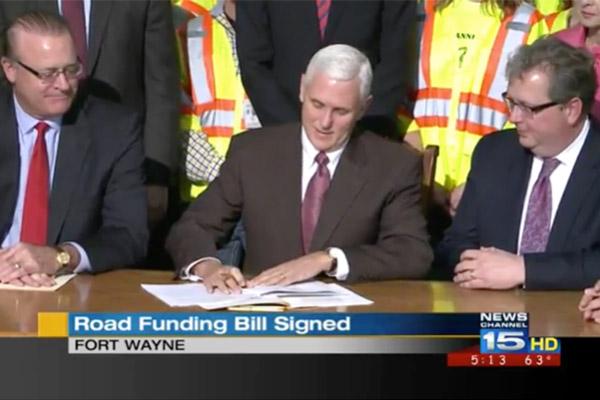 Pence signs $230M Indiana roads funding bill into law (AP)